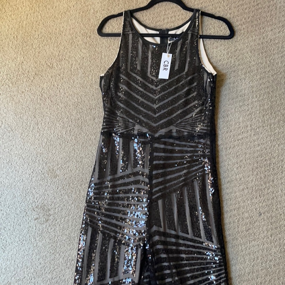 Sequence jumper, new with tag. Never worn.